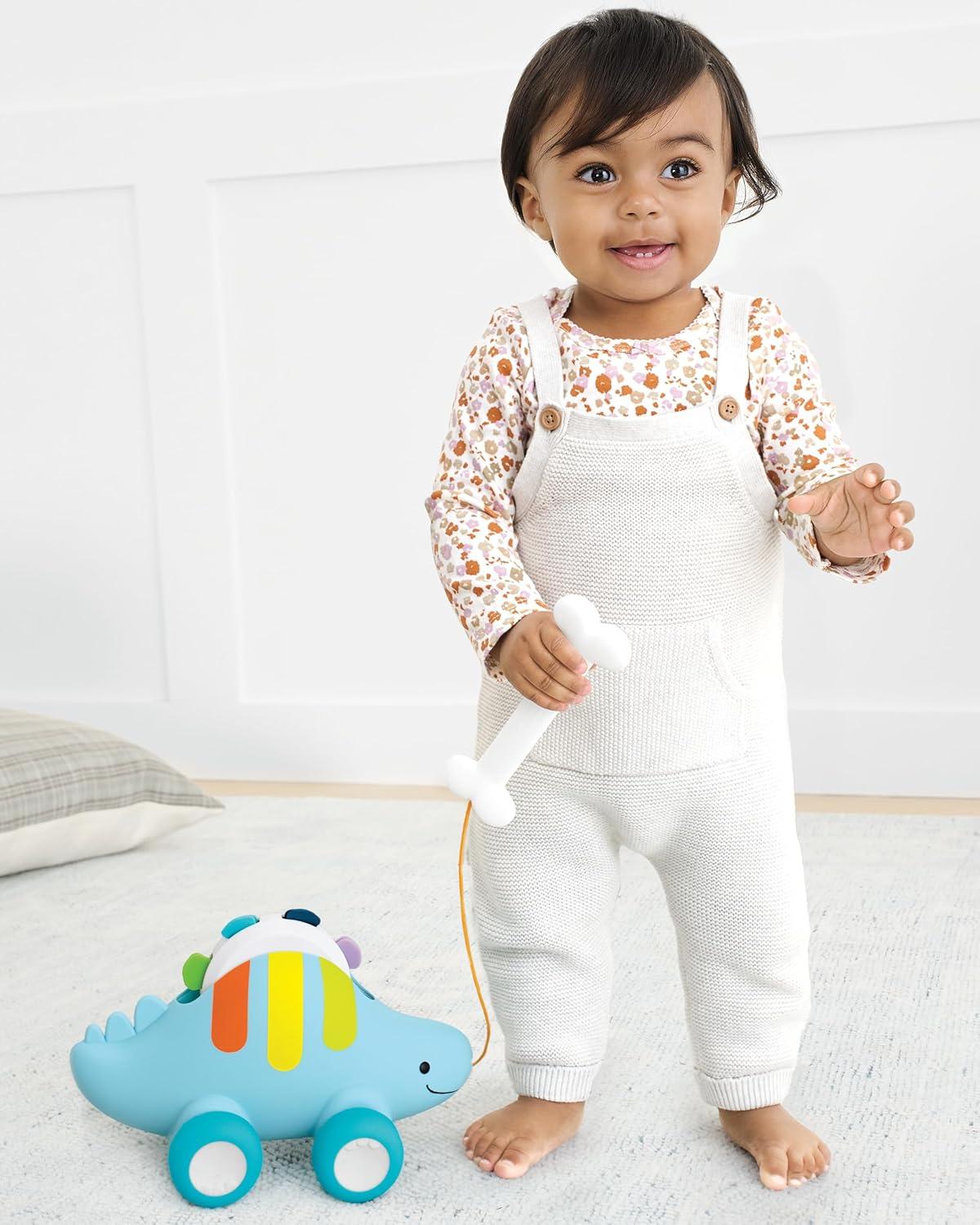 imageSkip Hop Dinosaur Pull Along Baby Musical Toy 3in1 Explore amp MoreDinosaur Pull Along