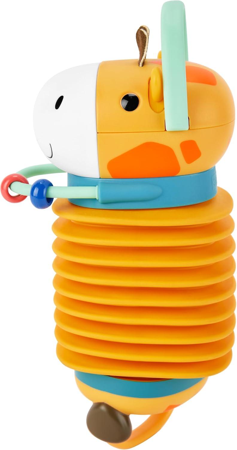 imageSkip Hop Dinosaur Pull Along Baby Musical Toy 3in1 Explore amp MoreGiraffe Accordion