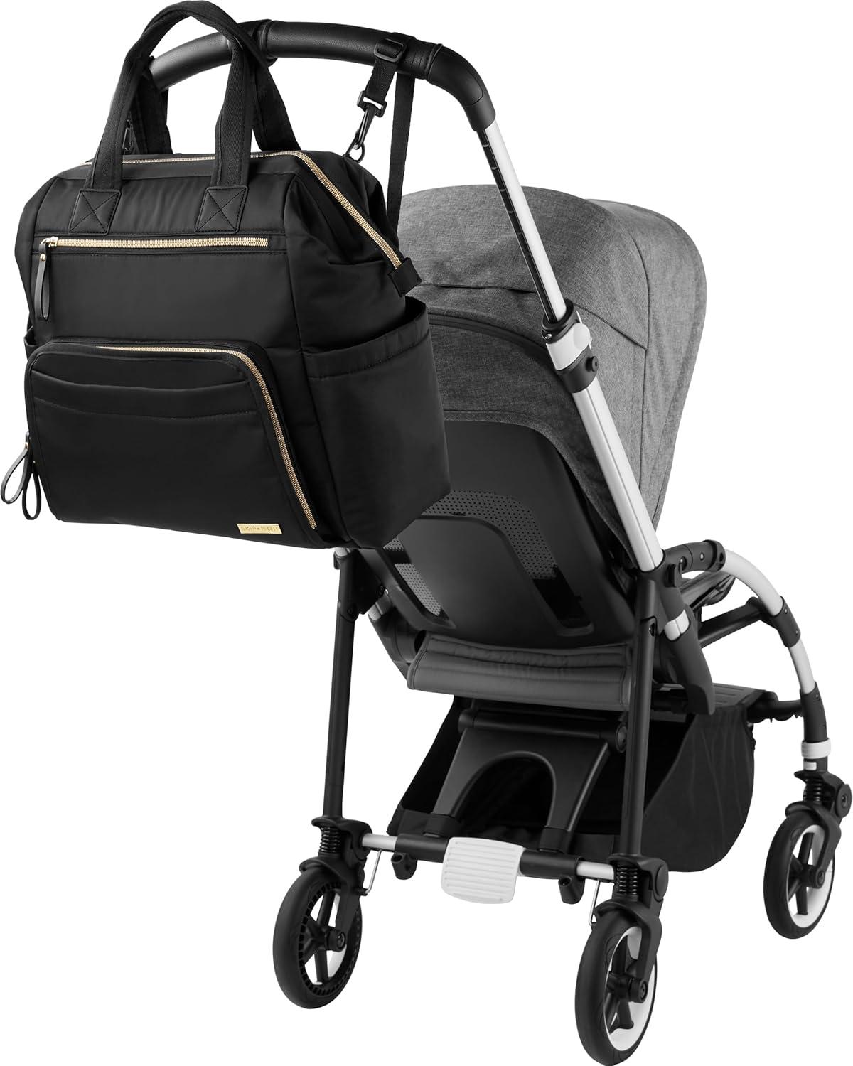 imageSkip Hop Diaper Bag Backpack Mainframe Large Capacity Wide Open Structure with Changing Pad amp Stroller Attachement Black with Gold TrimBlack